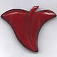 carved red Bakelite laminated pin