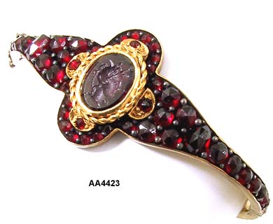 1890 to 1900 Victorian Garnet Bangle with Intaglio Cameo