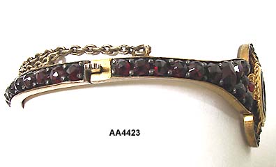 1890 to 1900 Victorian Garnet Bangle with Intaglio Cameo