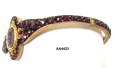 1890 to 1900 Victorian Garnet Bangle with Intaglio Cameo