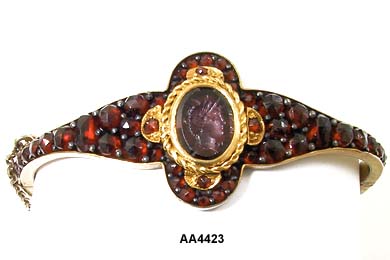 1890 to 1900 Victorian Garnet Bangle with Intaglio Cameo